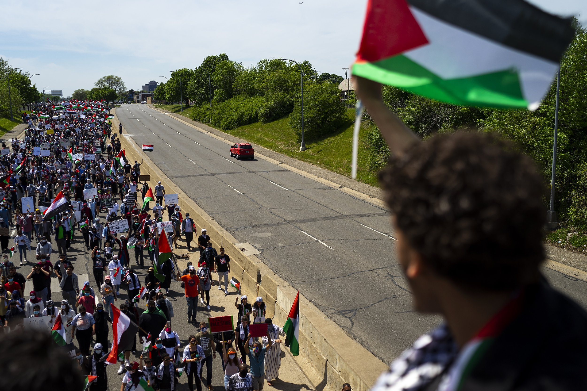  Demonstrators march down Michigan Avenue during a rally and march in support of Palestine on Tuesday, May 18, 2021, in Dearborn, Mich. The crowd was estimated to be between 2,500 to 3,000 people. Dearborn holds the highest concentration of people of