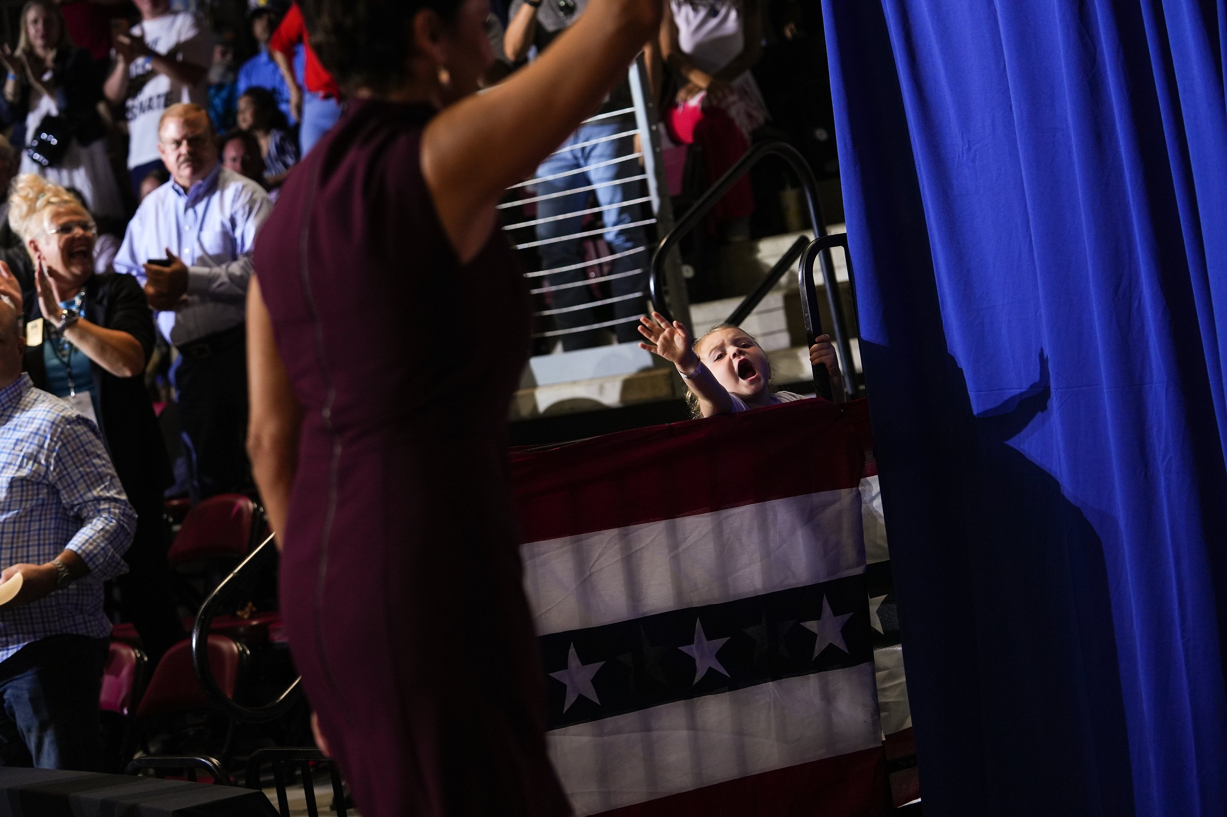  A child tries to get the attention of Kari Lake, Republican candidate for Arizona governor, as she walks off stage after delivering a speech during a Save America rally on Friday, July 22, 20222, in Prescott Valley. Former President Donald Trump hea