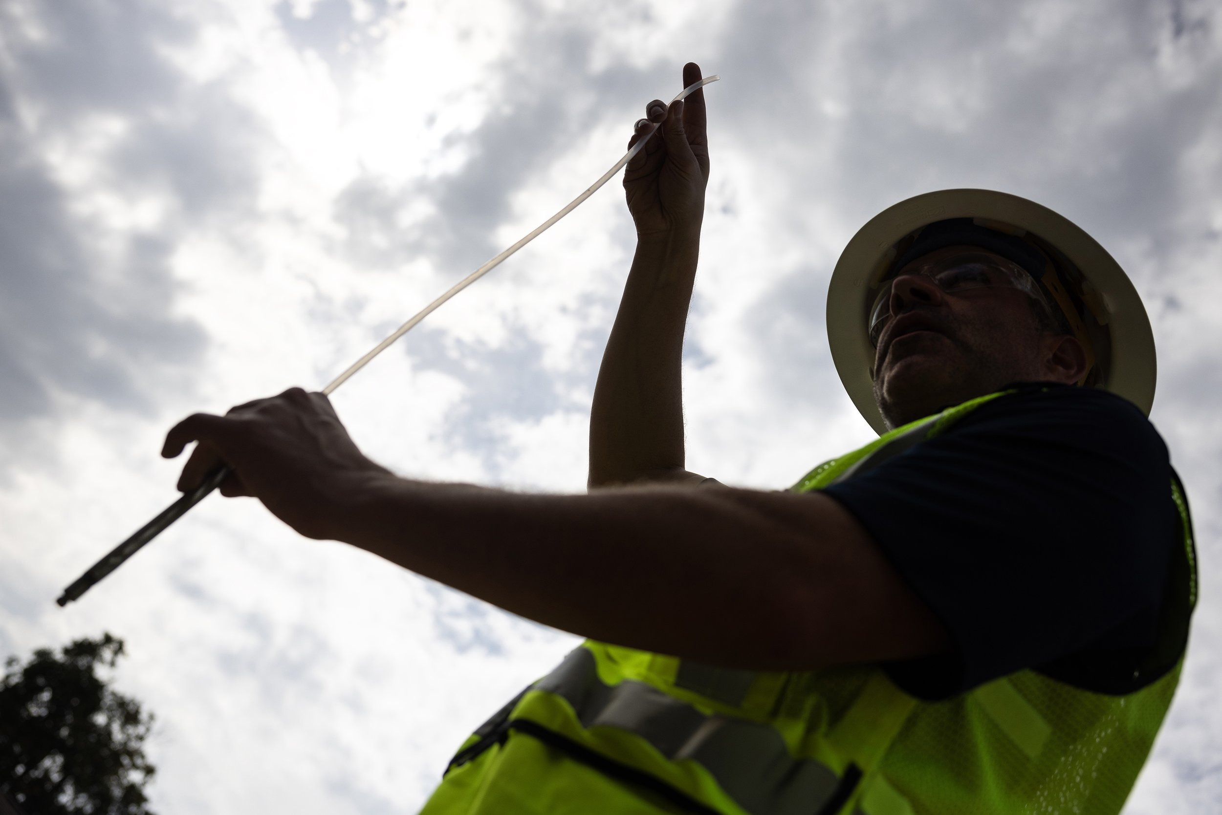  Kevin Peterburs, Union Pacific’s senior manager for environmental site remediation, holds up a segment of a device used to ultimately measure the level of fumes coming from toxic plumes underground, Thursday, Nov. 9, 2023, in Houston. While facing h