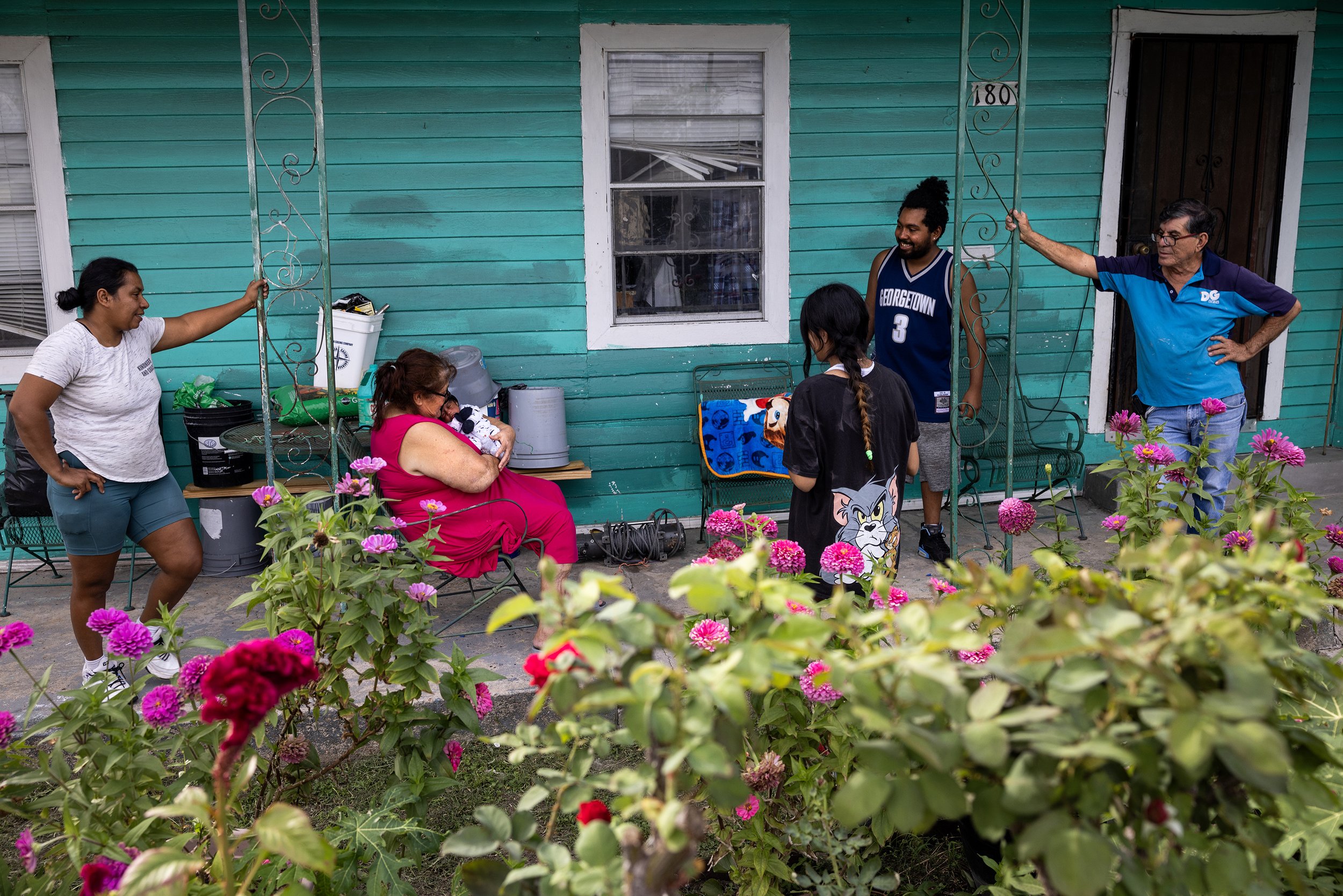  David Caballero, second from right, and his wife Jasmine Ortiz, at center, introduce their two week old baby Jose Manuel Caballero Ortiz to Caballero’s grandmother Maria Arcos, at left, Monday, Nov. 6, 2023, in Houston. Caballero, who now lives in N