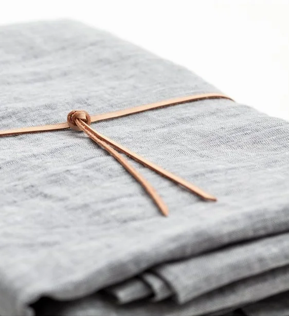 Pure European linen tablecloth finished in Montreal by Mariana Robledo of Objective, $120 (90x55in).