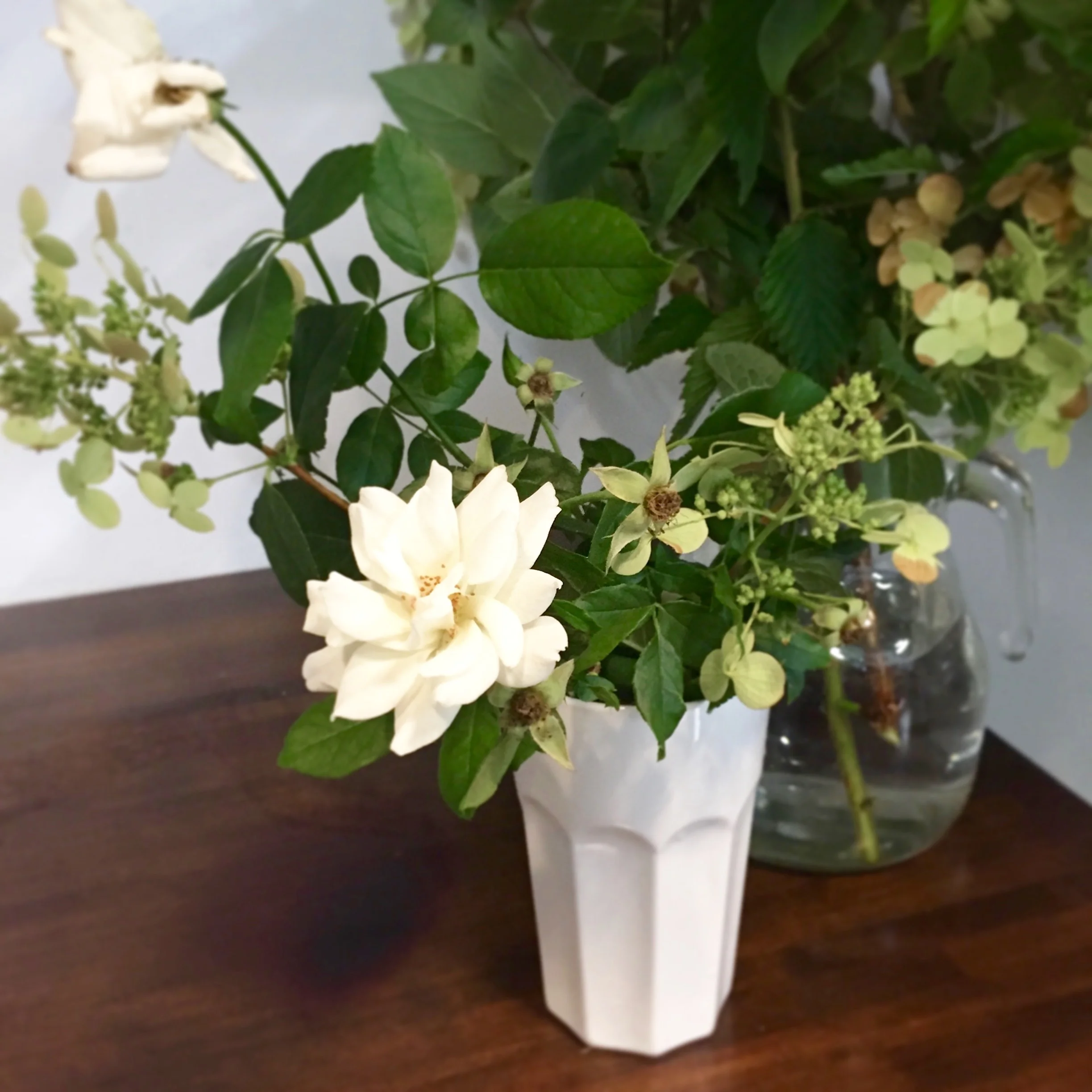 foraged flowers standing by