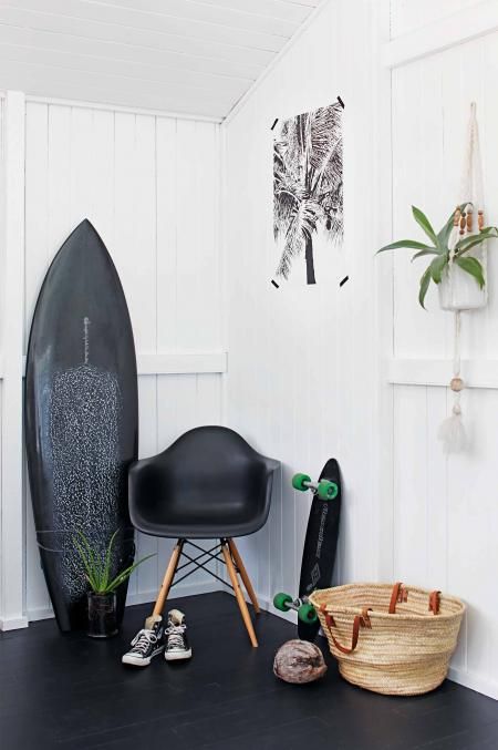 A Queensland home with a strict black and white palette and a great looking little board tucked in a corner. Design: Simone Barter Design Studio .