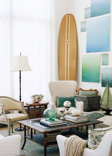 An Oxnard home by Giannetti Home with paintings by Steve Giannetti and a spectacular vintage board. 
