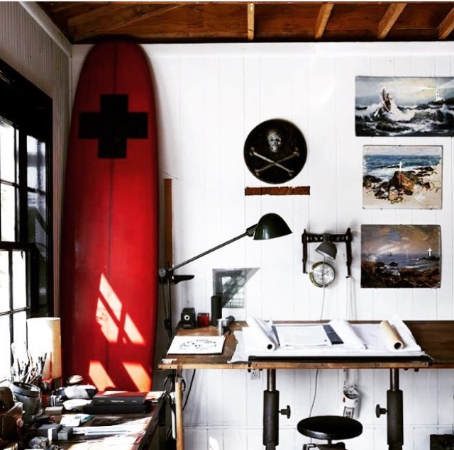  A view of the  Roman &amp; Williams  studio via Instagram. Whodathunk surfboard as office decor? Them apparently. 