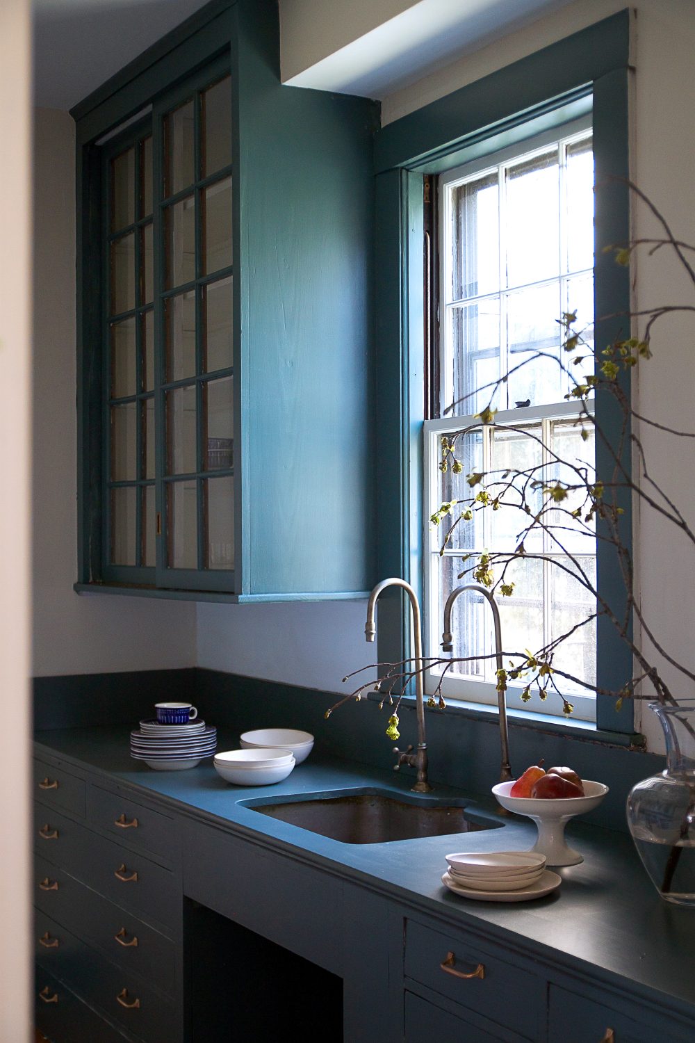  Justine Hand painted a butler's pantry, including counter, in Inchyra Blue. 