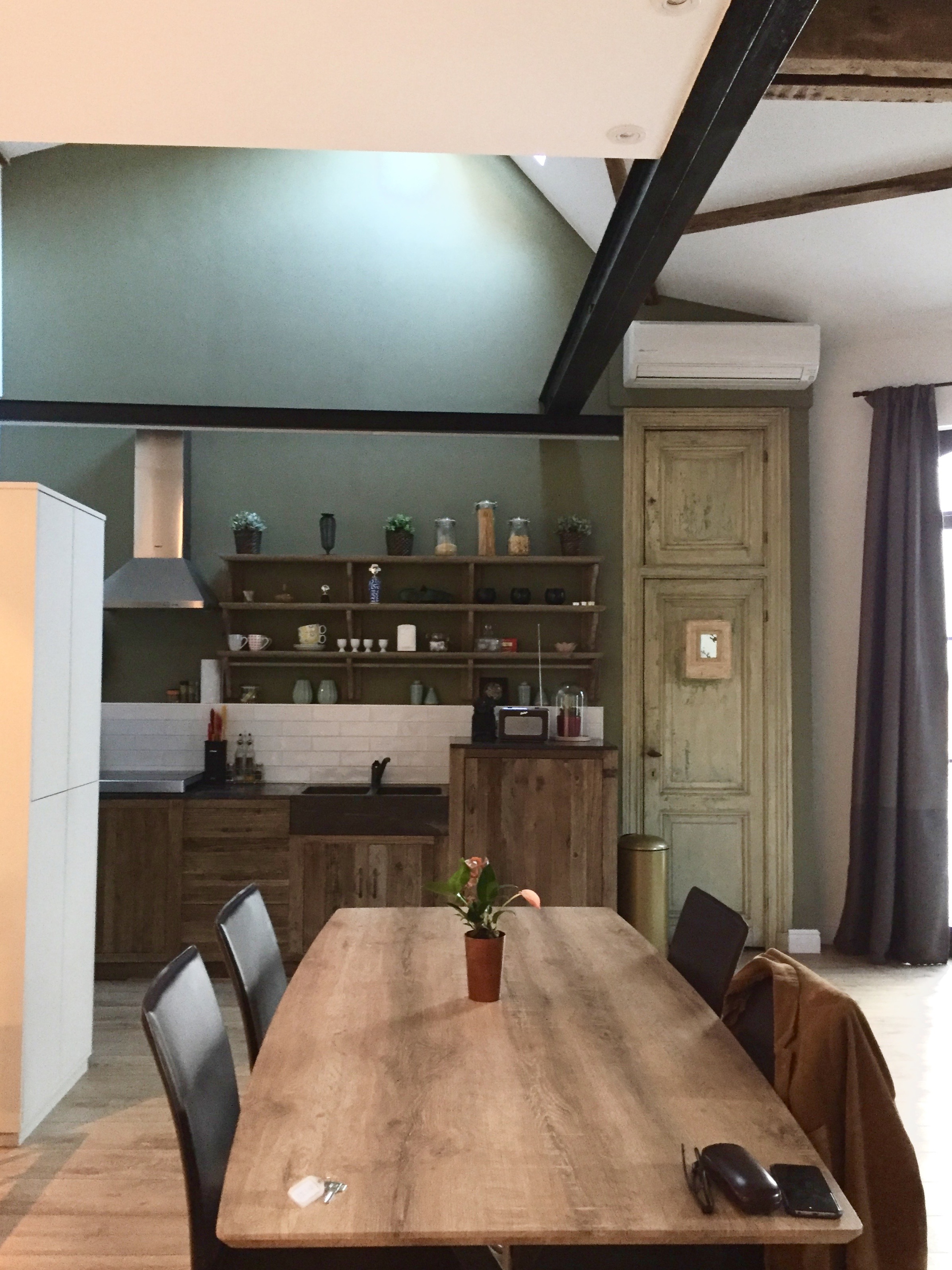  The kitchen had the best rustic reclaimed wood cabinets and honed black stone counters and sink. 