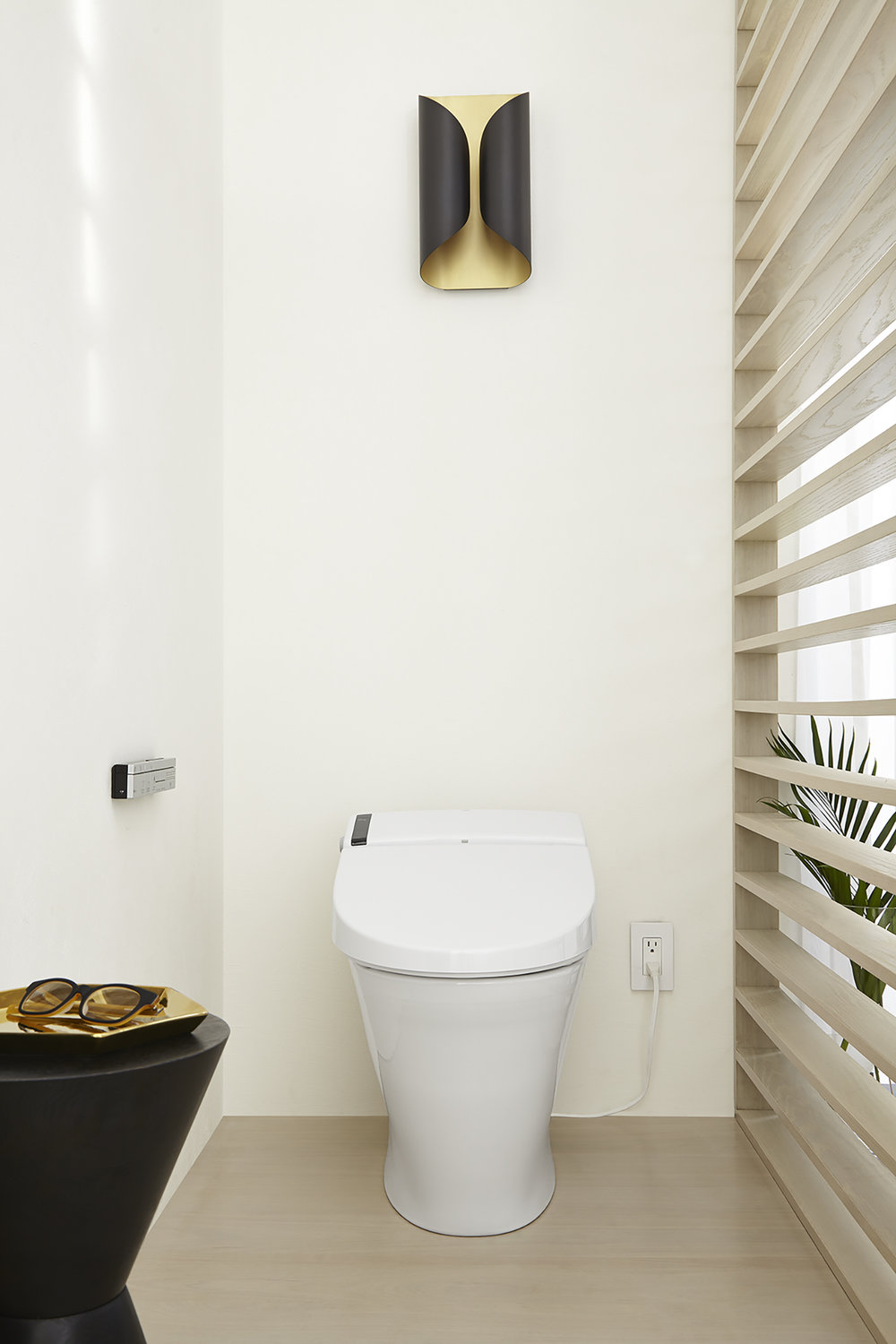  This spectacular piece of technology is a toilet and bidet in one (It also includes an air freshener — not kidding). Meet the  SpaLet AT200 toilet.  