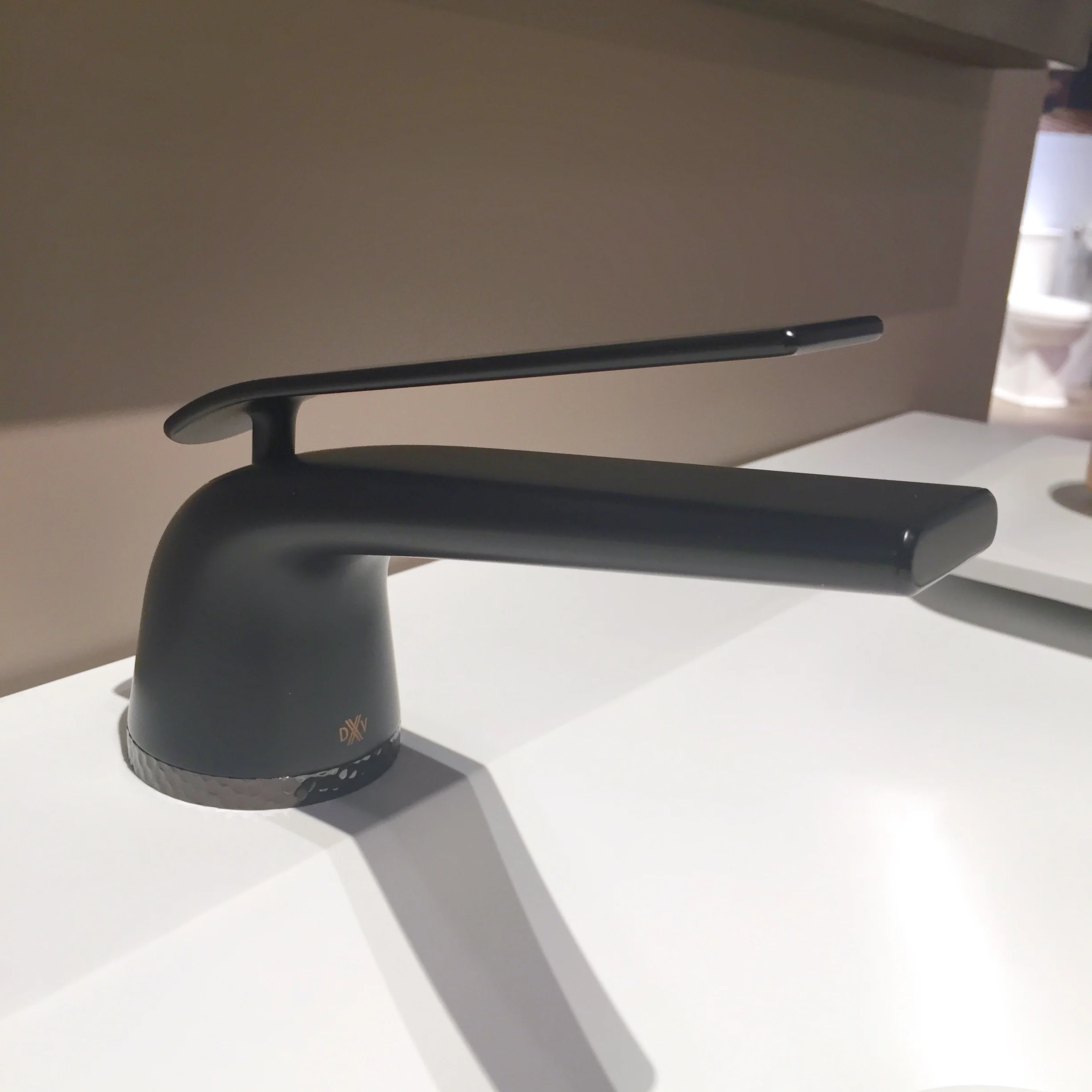 This faucet is a total beauty. Even though it has a sleek silhouette it feels soft and comfortable to the hand. Take a closer look at the base of the faucet. Do you see the faceted ring?