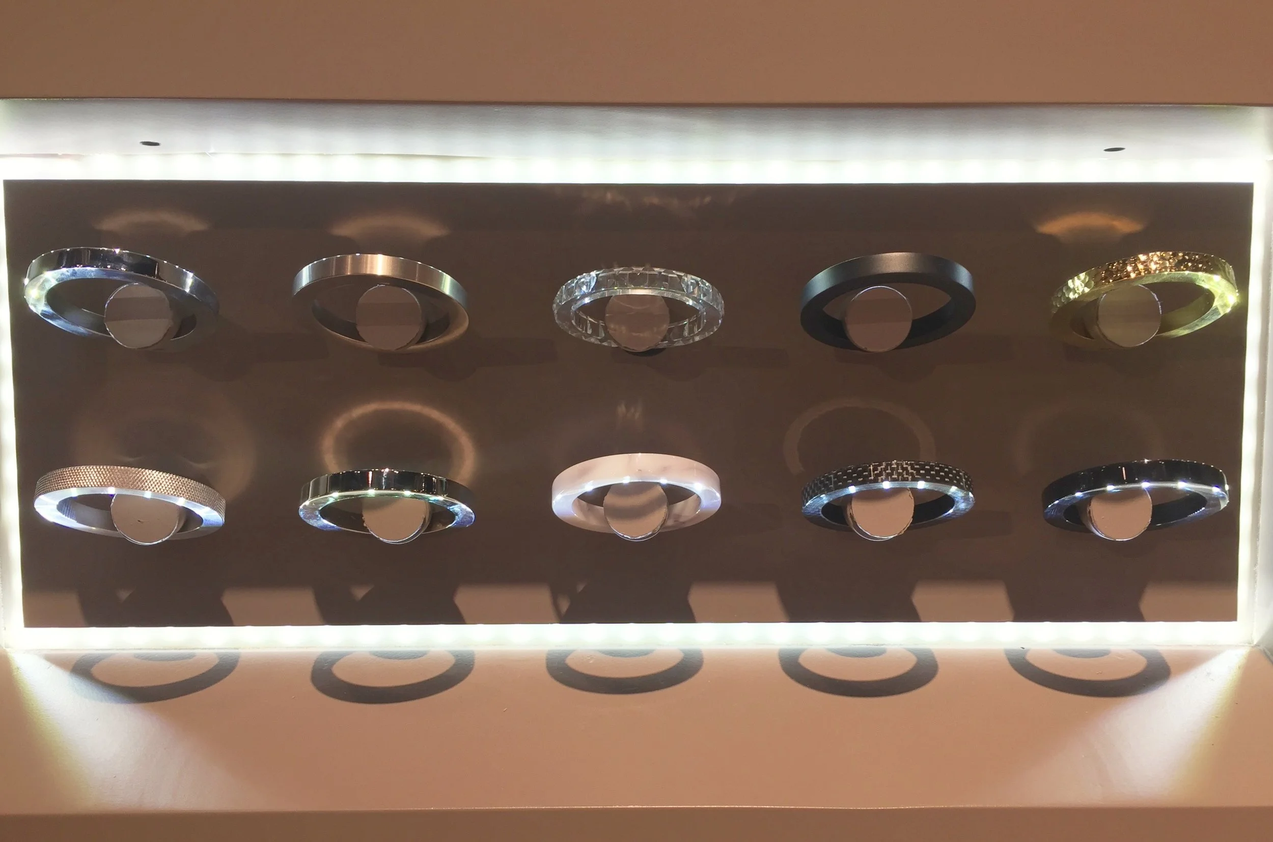 Here's some super newsy news for you: that ring is a point of customization. The faucet comes shipped with a ring to match the faucet finish, but you can opt to kick things up a notch with one of these fancy pants designs. I confess I found them ver