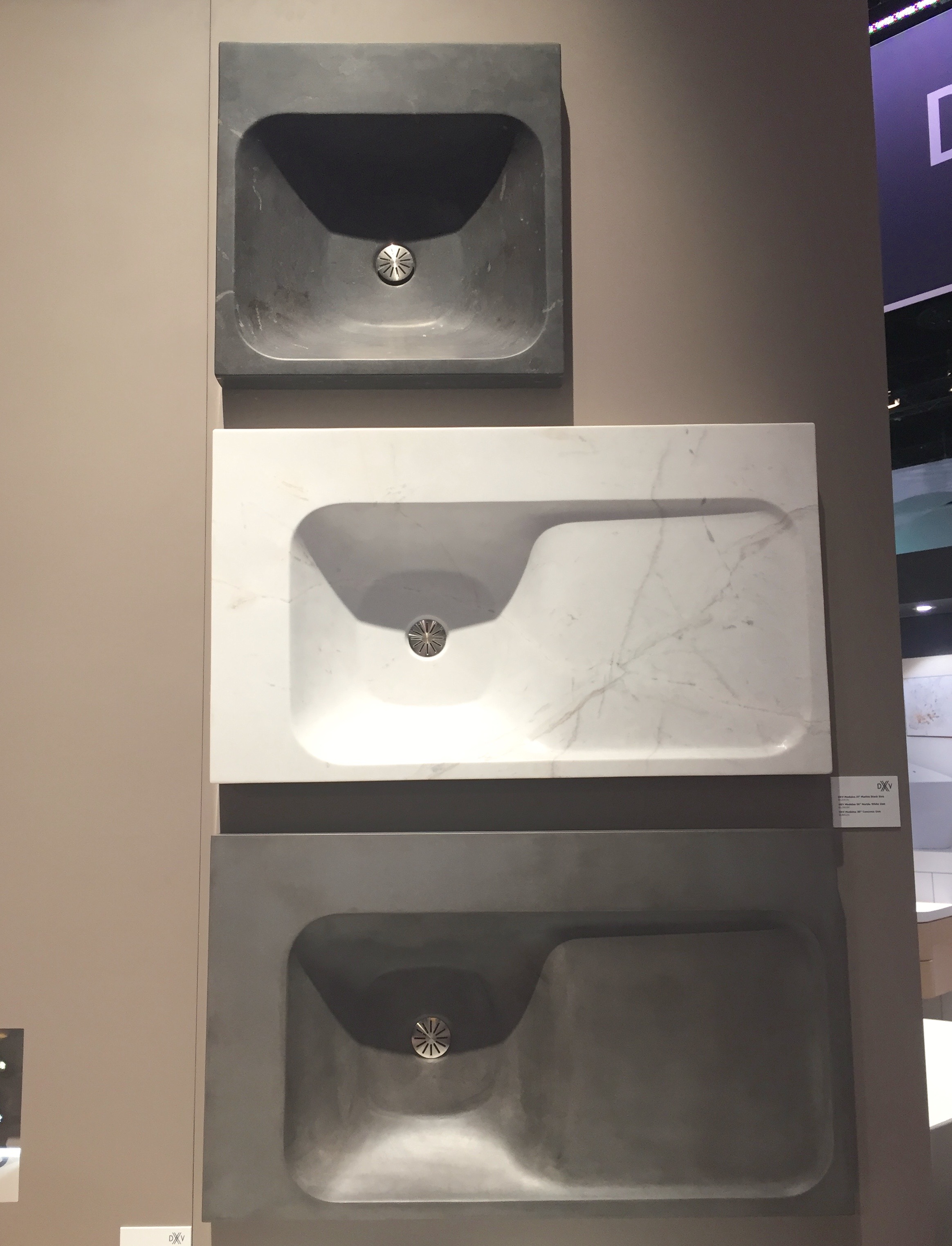 In addition to solid surface material, Modulus sinks come in (from top) black marble, white marble and concrete. Gorgeous!