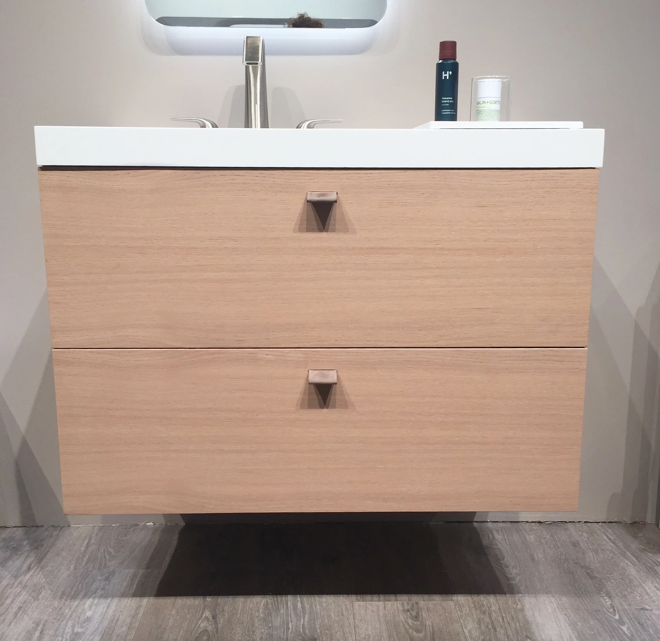 Here's a closer look at the cabinet. It is fitted with pulls made of leather from a watchband factory.