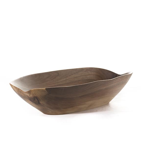  You can have your birch and your curly maple and whatever other wood may be of the moment. Make mine the walnut. All chocolatey and warm and delicious. This piece is made by local woodworking master Mark Hinan. It's a beauty!  Walnut Bowl,  $250 