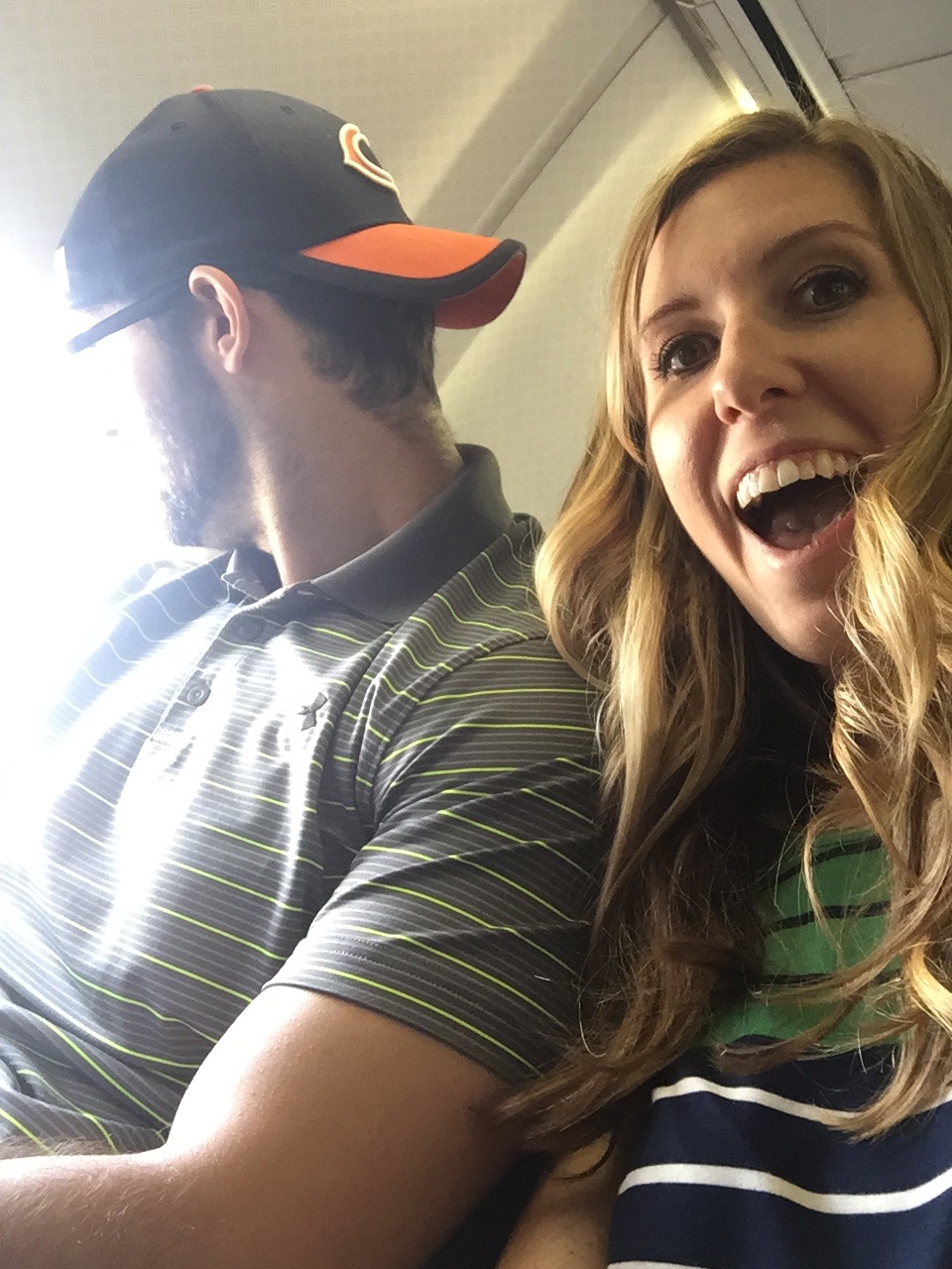 Chauncey refusing to take a picture on the plane