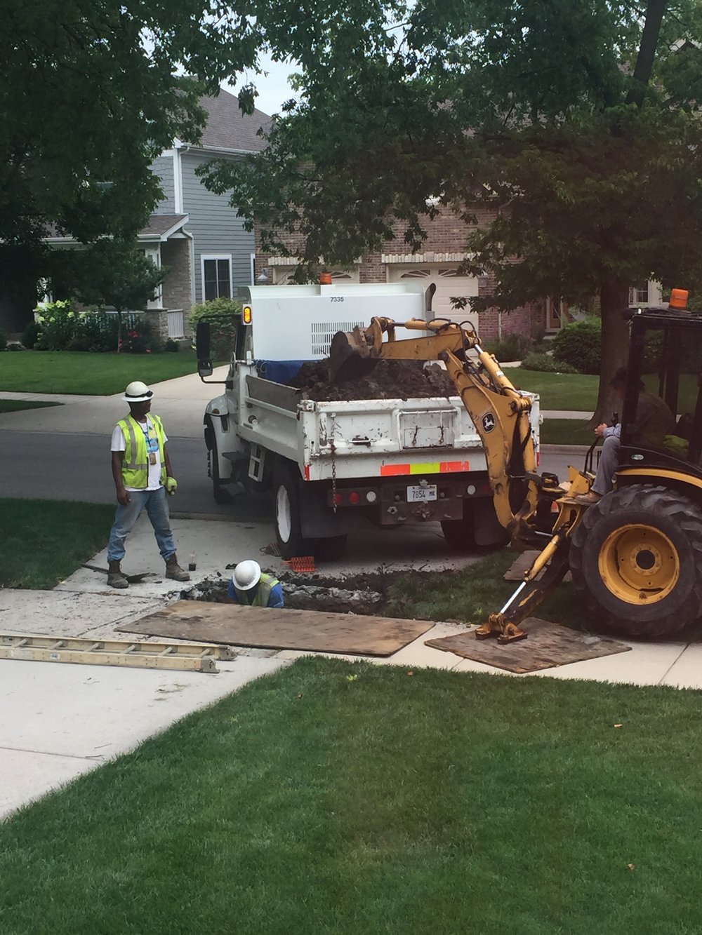 No big deal. Just a massive human-sized hole in our driveway.