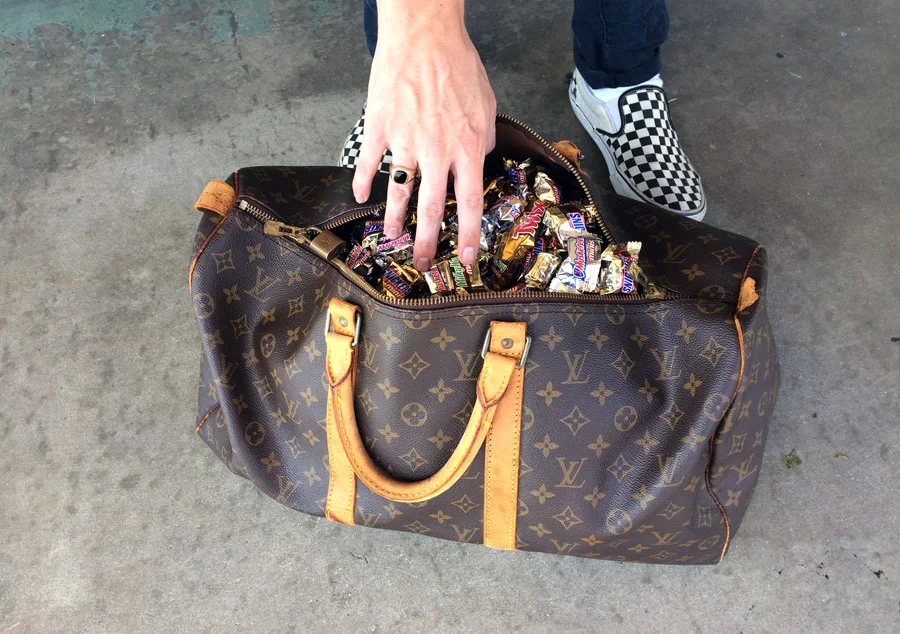Luxurious Trick-or-Treat Bag. Jon shows us how trick-or-treating is done at the shop. Vintage Louis Vuitton Keepall 60 Bandouliere, checkerboard Vans slip-ons. 