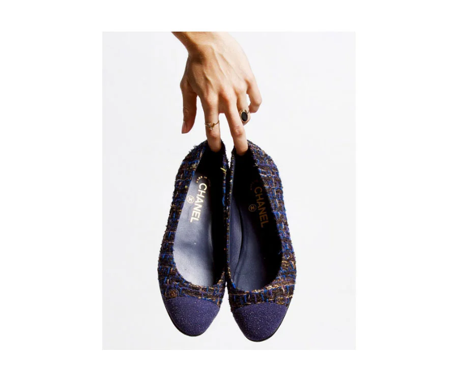Cap toe tweed flats.