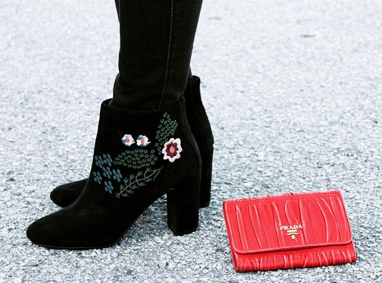Embroidered bouquet suede boots by Nanette Lepore . Ruched leather Napa Gaufre wallet by Prada . 