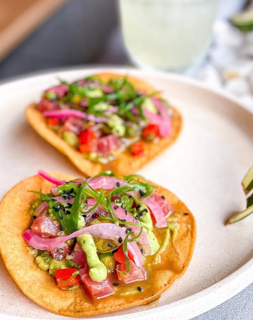 Relaxed holiday atmosphere at Kirra Point with surfers and families