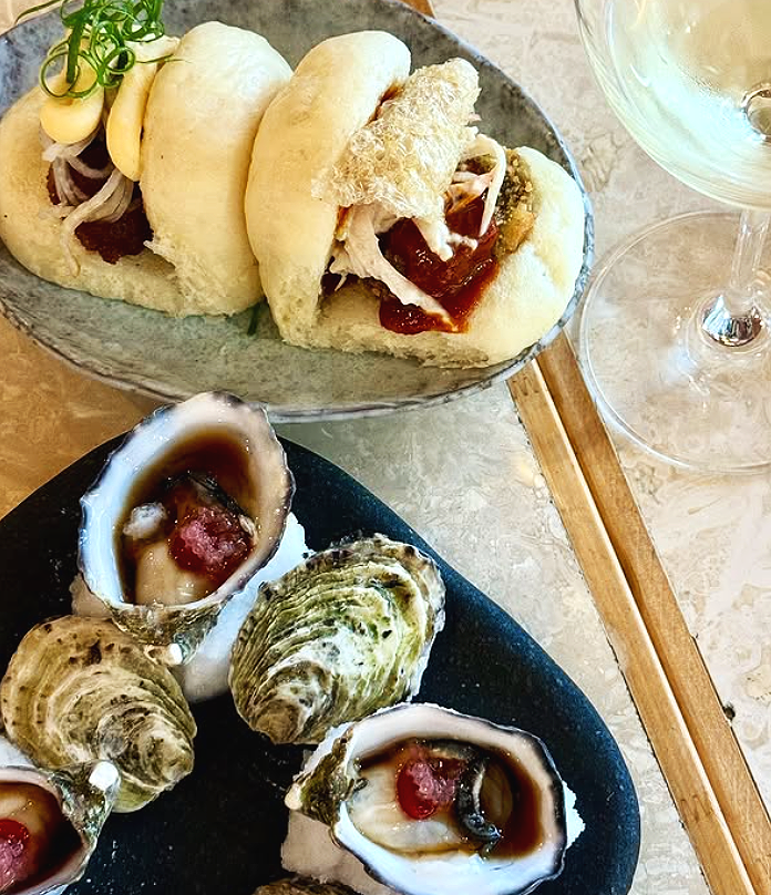 Relaxed holiday atmosphere at Kirra Point with surfers and families