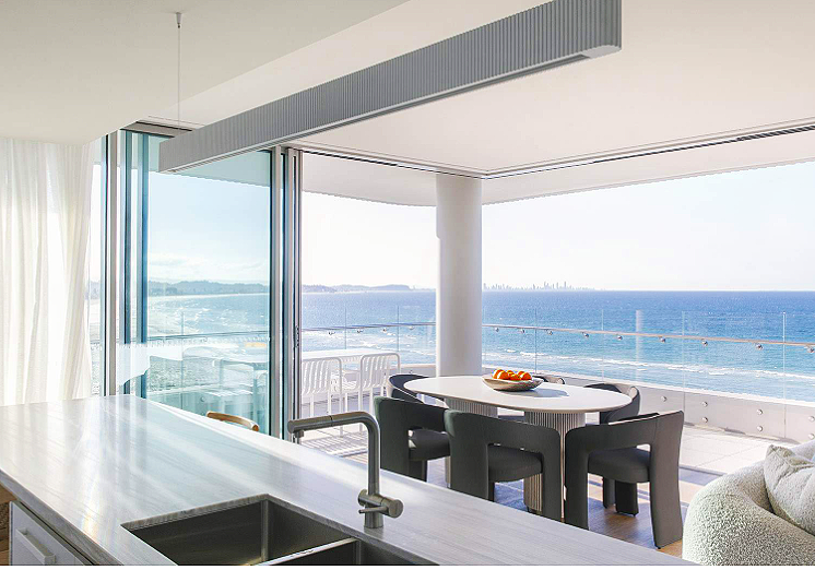 Relaxed holiday atmosphere at Kirra Point with surfers and families