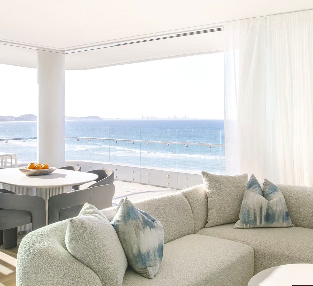 Relaxed holiday atmosphere at Kirra Point with surfers and families