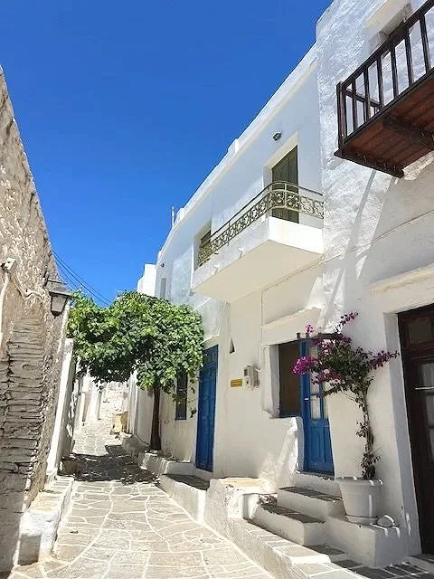 Scenic alleys of Sifnos village overlooking the Aegean Sea