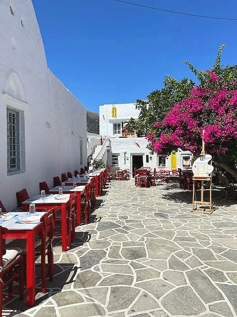 Scenic alleys of Sifnos village overlooking the Aegean Sea