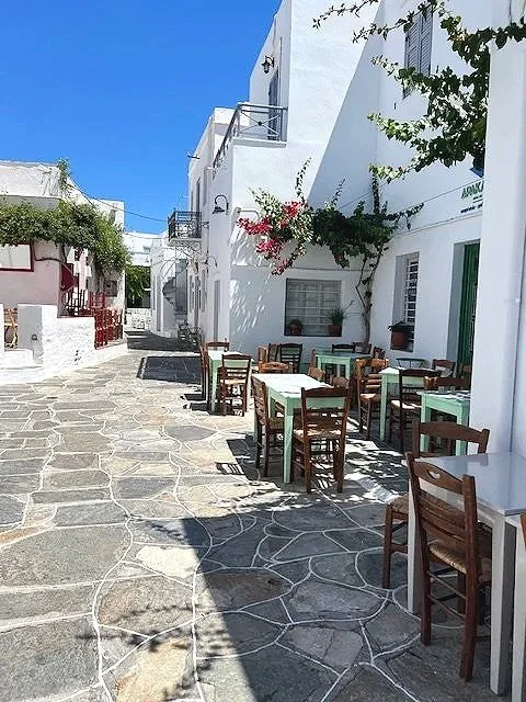 Scenic alleys of Sifnos village overlooking the Aegean Sea