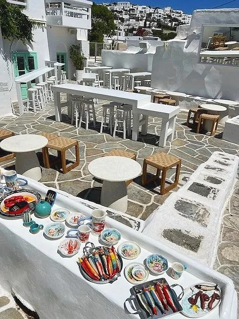 Scenic alleys of Sifnos village overlooking the Aegean Sea