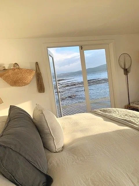 Relaxed luxury interiors on Satellite Island blending comfort and wilderness