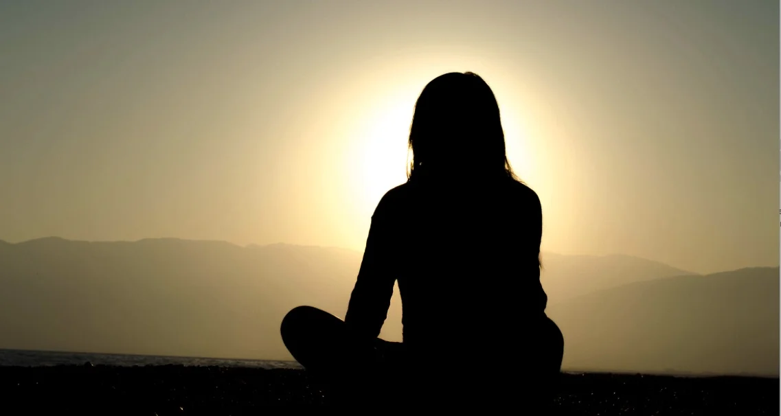 Girl+Silhouette+Meditating+Sun+Beam.jpg