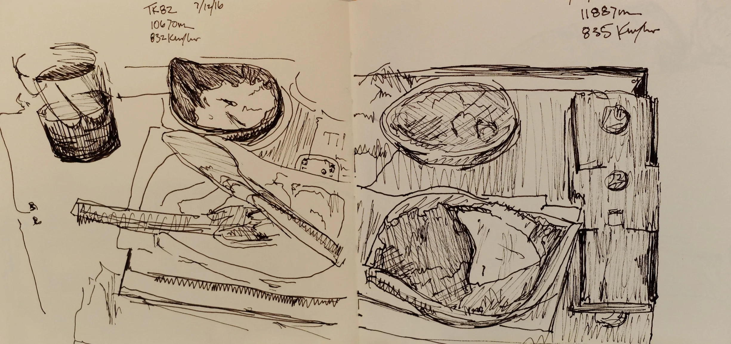 Detail: Trying to fit everything on a tray table and eat without elbowing your neighbour