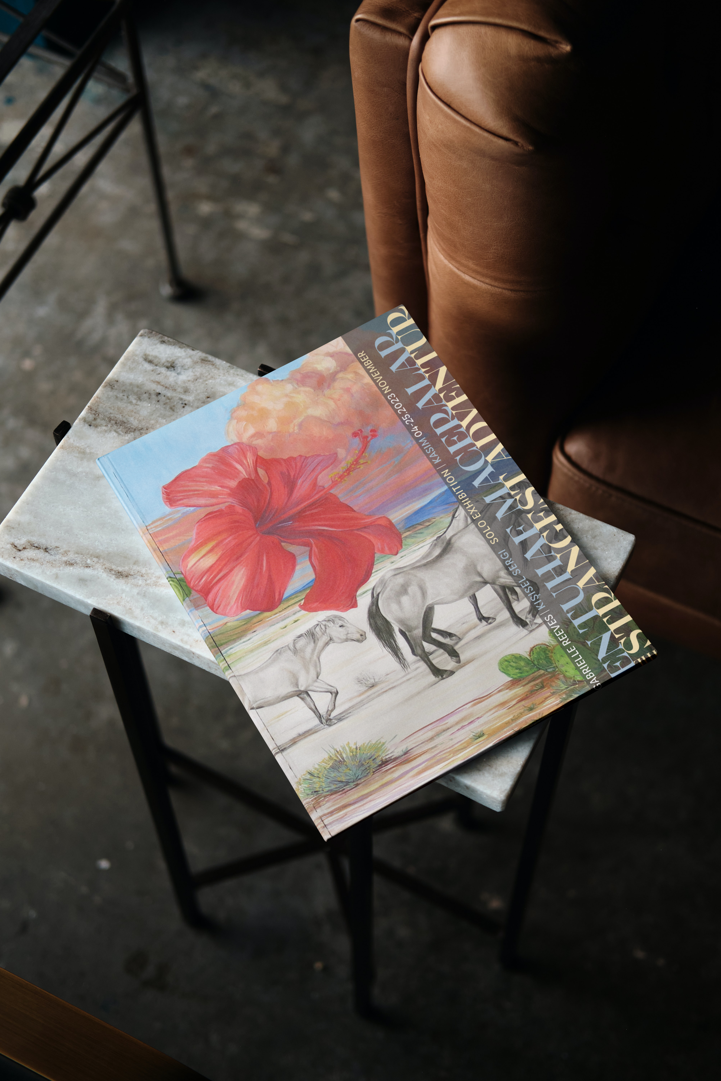 Free Magazine on Marble Table Mockup.png