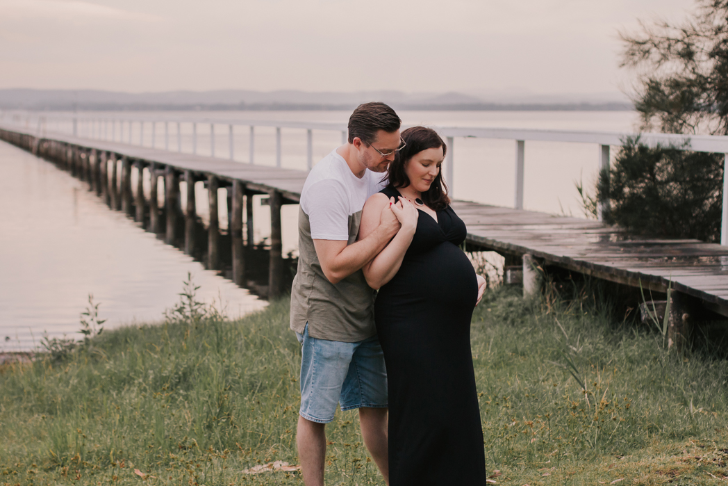 pregnant couple looking at their baby