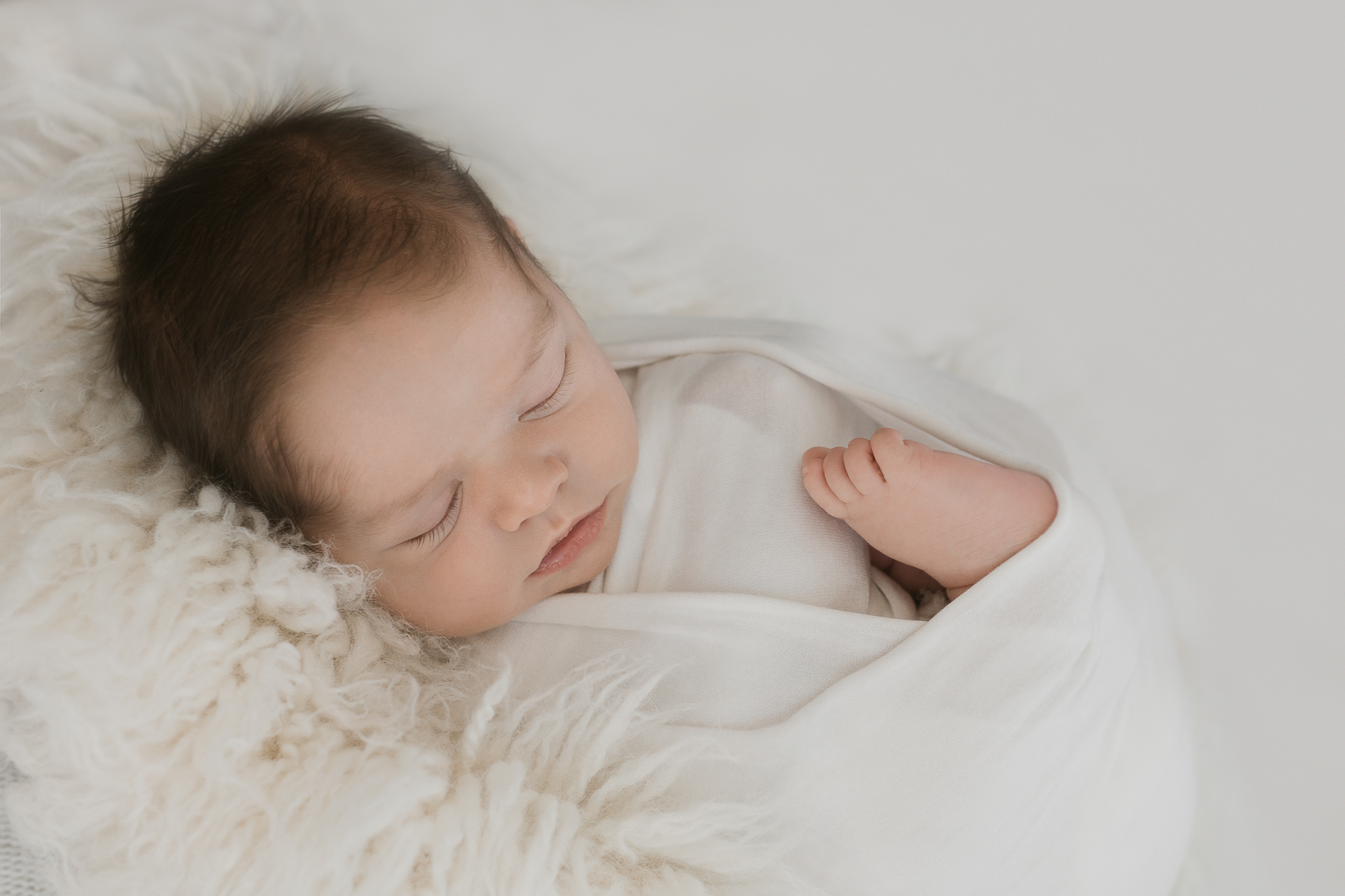 newborn photo by central coast photographer wrapped up tight