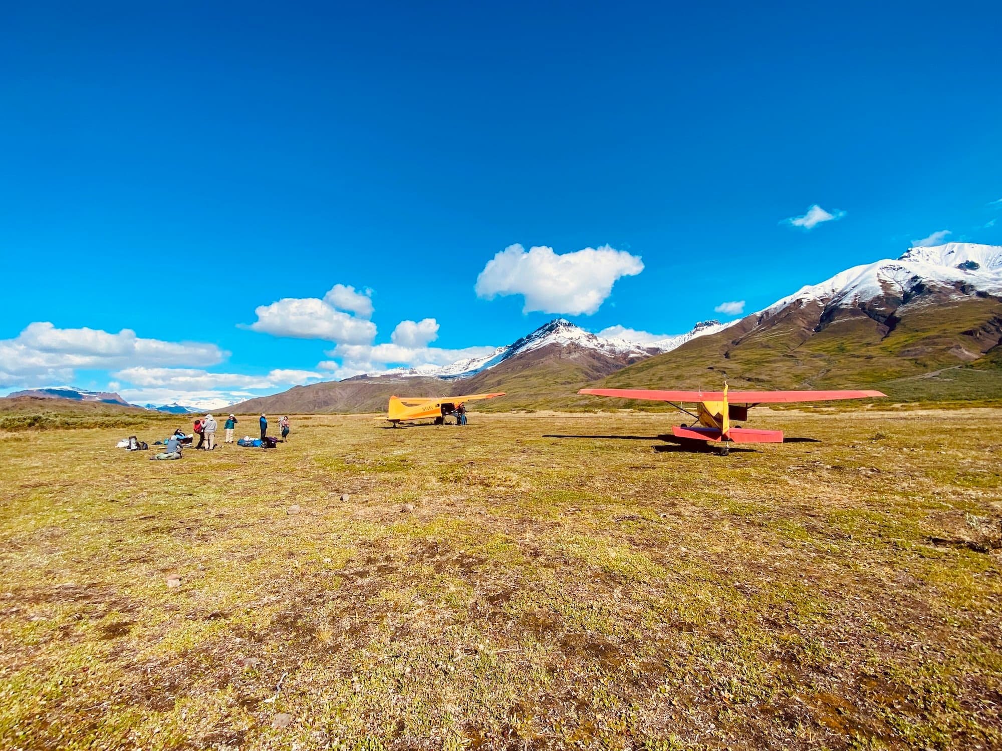 Skolai-loading-plane.jpg
