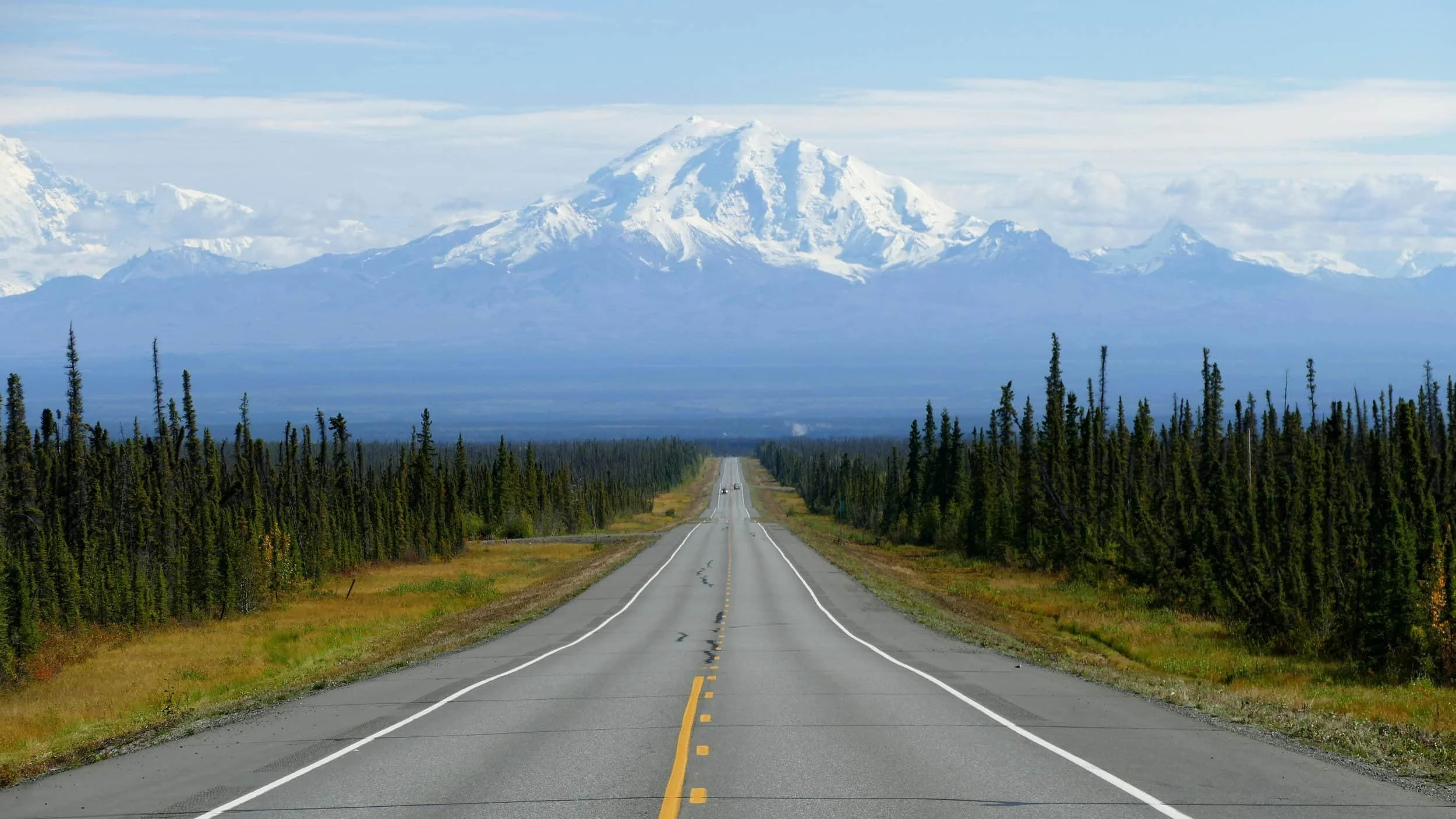 Looking down the road towards the Wrangell mountain volcanoes.