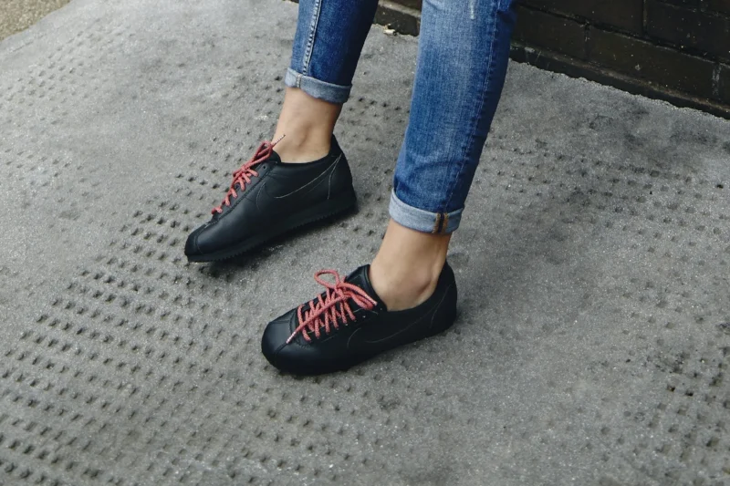 Sarah: H&M jeans, Nike Beautiful x Classic Cortez Premium trainers, ropeslaces.com laces