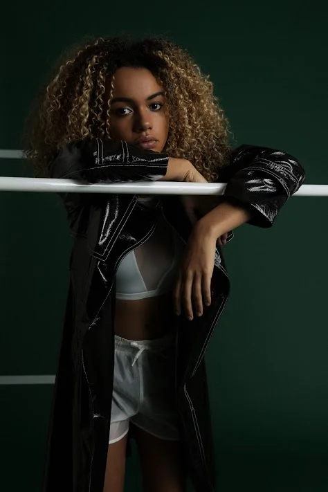Jacket, Markus Lupfer | Top, Varley | Shorts, Ivy Park