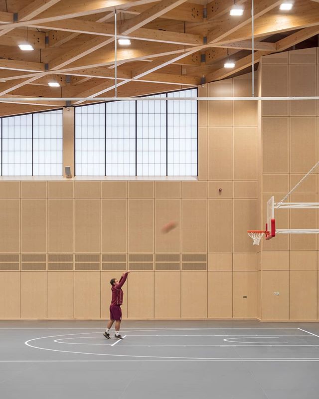 🏀 From a recent shoot inside St George's College new high-tech sports hall designed by @scottbrownriggltd Architects. Electronic light displays incorporated into the floor allow for the display of different courts and pitches. Photography for @struc