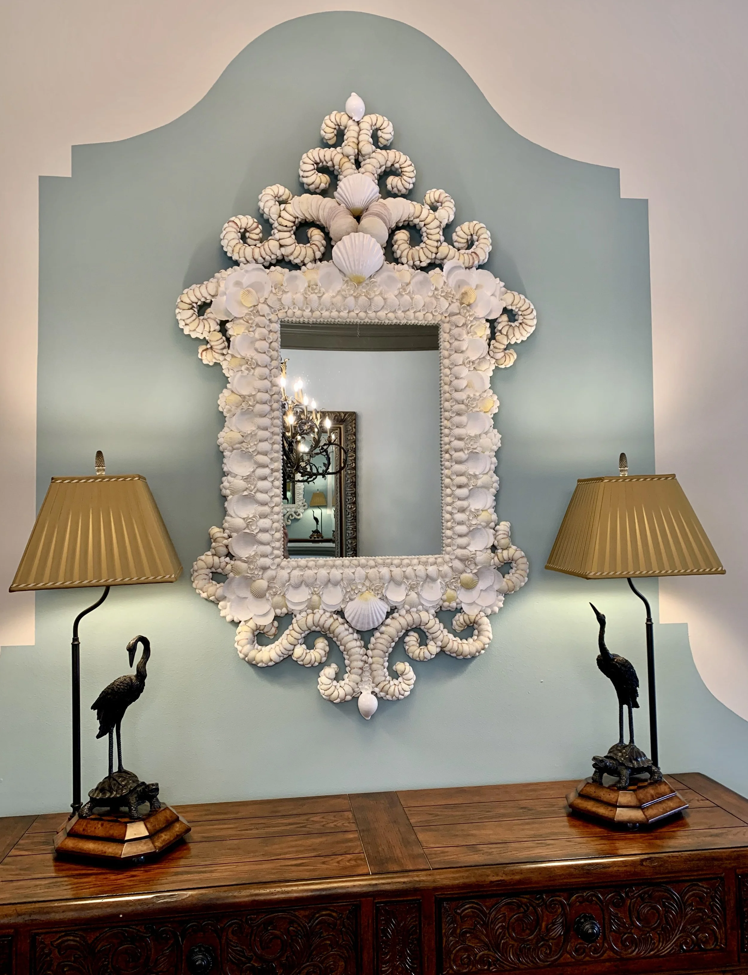 coastal interior design of foyer with shell mirror in Palm Beach