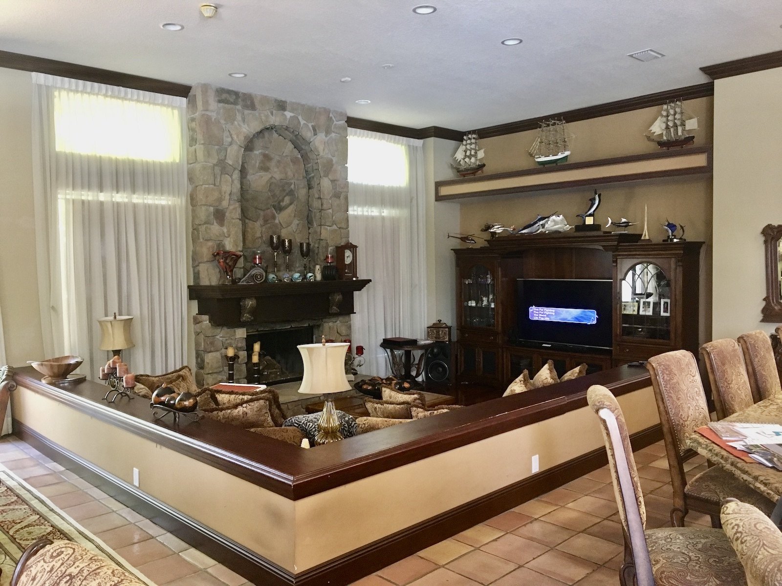 before of Mediterranean great room with fireplace