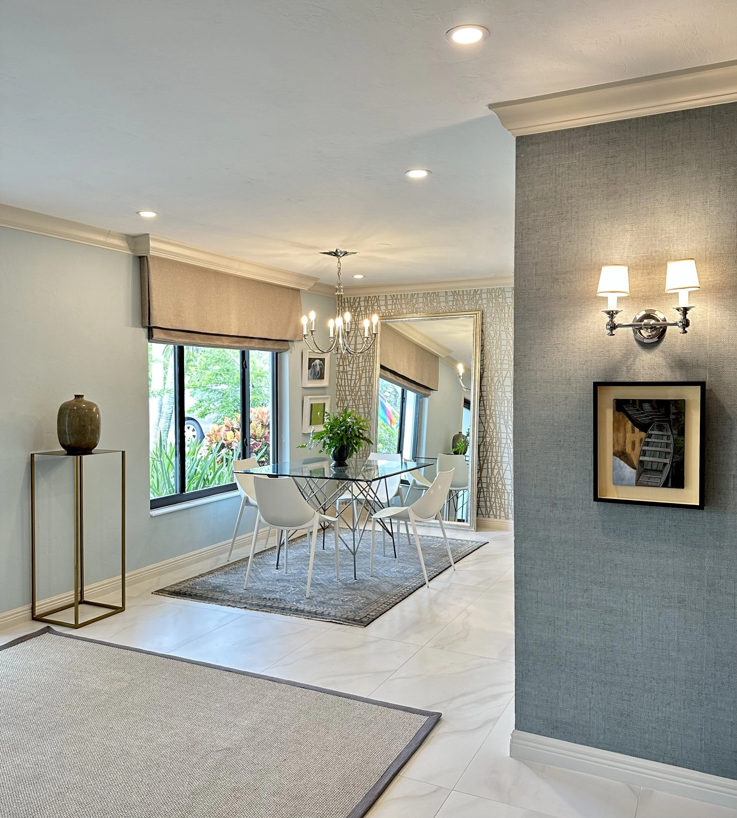 modern coastal style dining area with custom window treatment in Fort Lauderdale