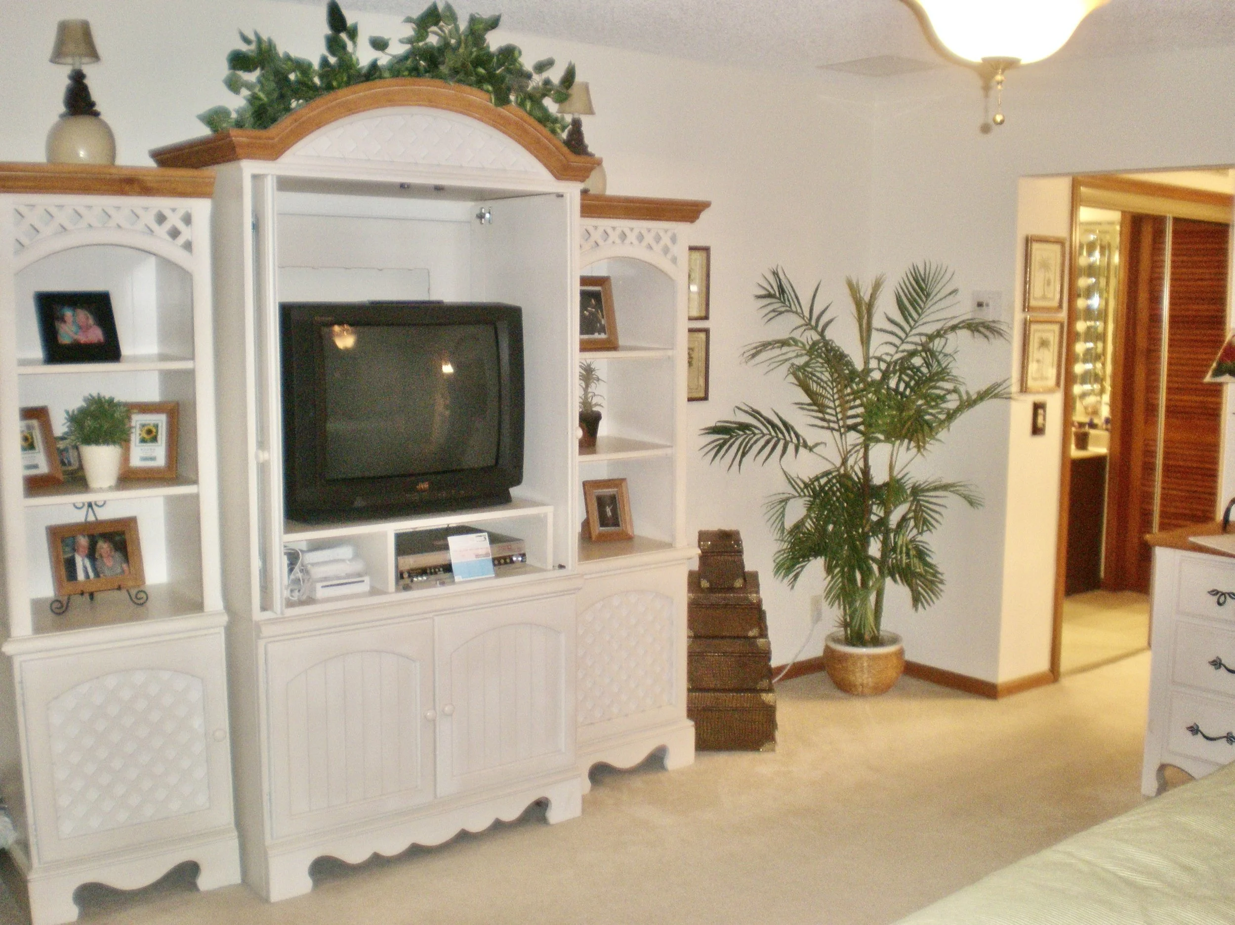 before picture of primary bedroom's wall unit