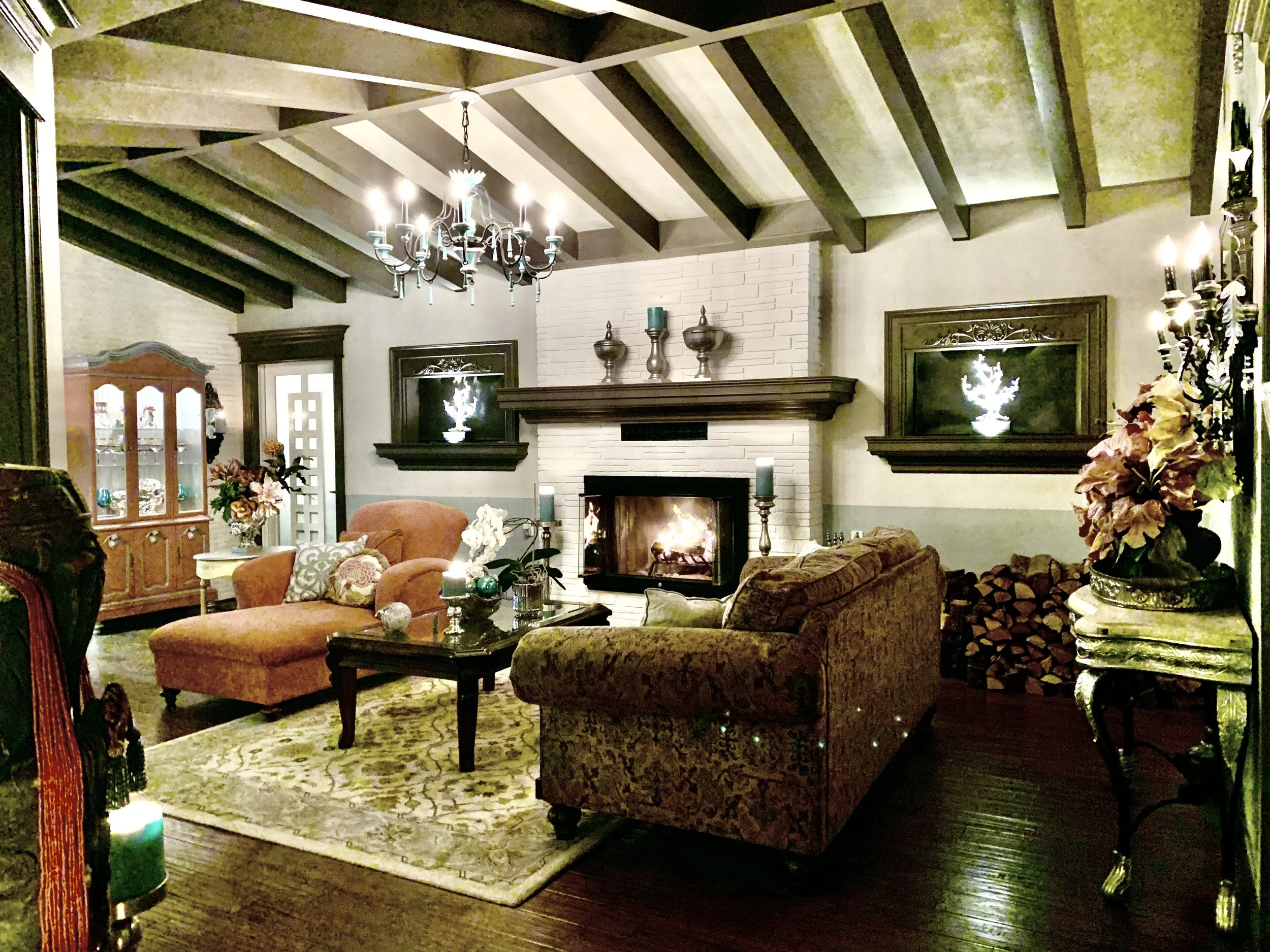 Transitional  style living room with fireplace, wood beam ceiling, wood molding in Fort Lauderdale
