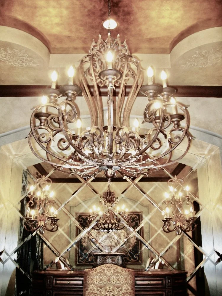 traditional mediterranean dining room mirrors gold chandelier
