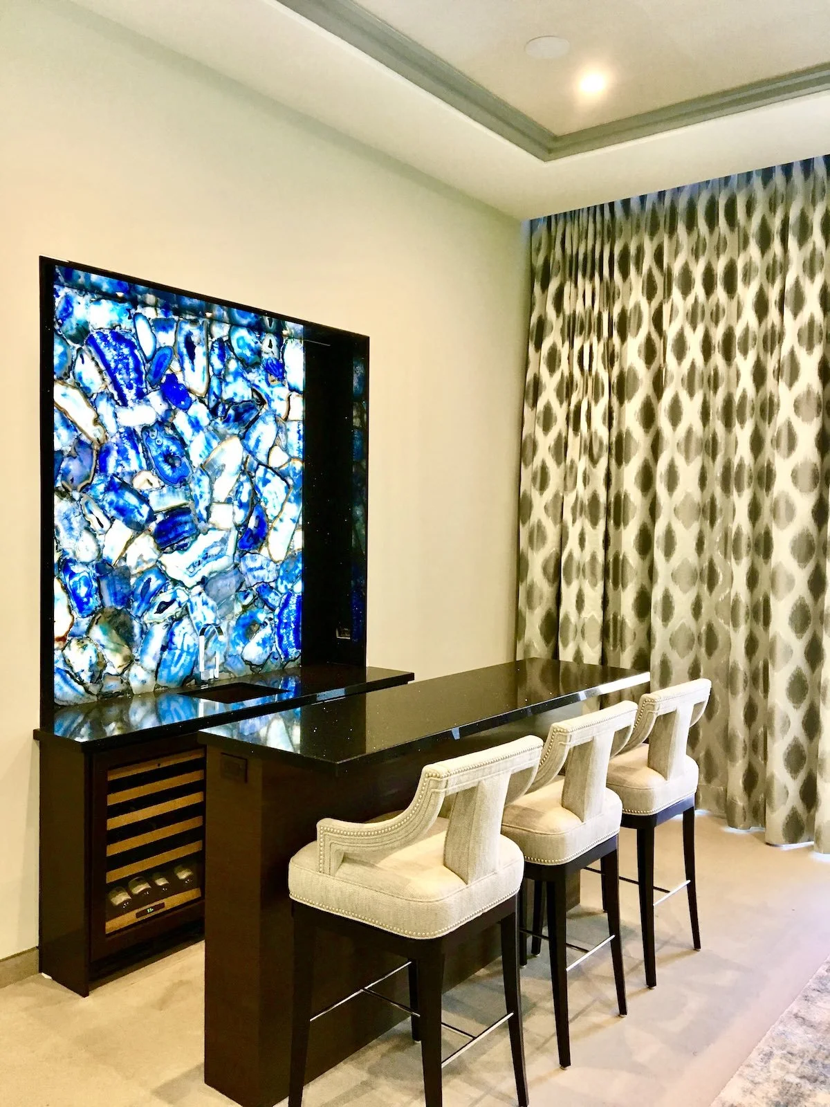 modern custom bar stools in cream fabric with silver nailheads in Fort Lauderdale