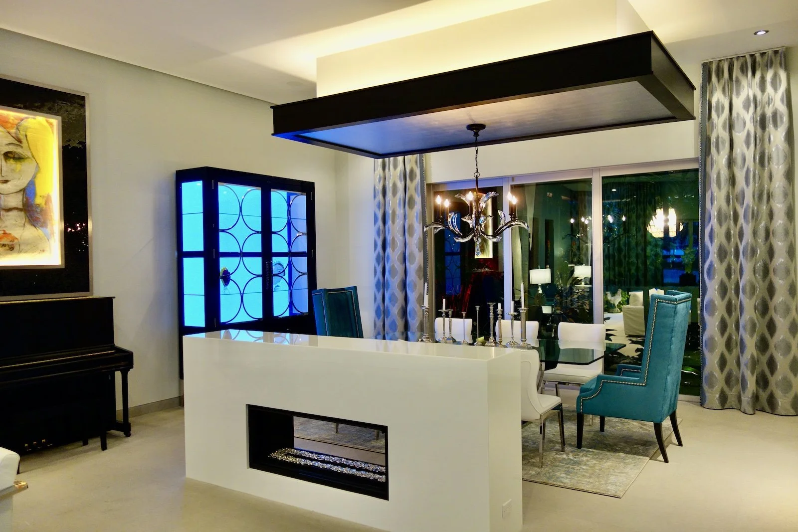 dinging room with custom black and silver dining hutch with custom dining chairs in Fort Lauderdale