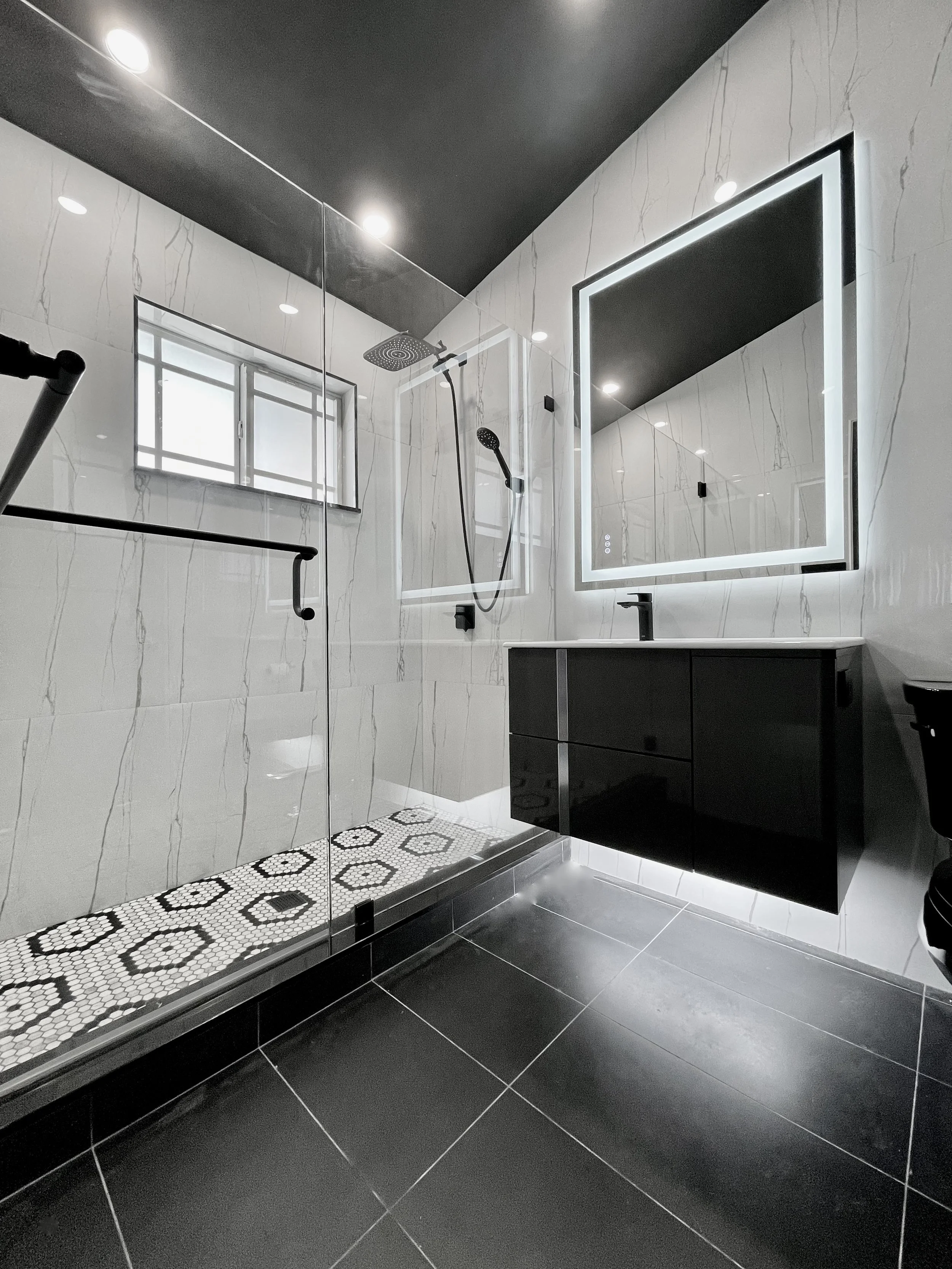 modern home remodeling of black and white bath room in Fort Lauderdale